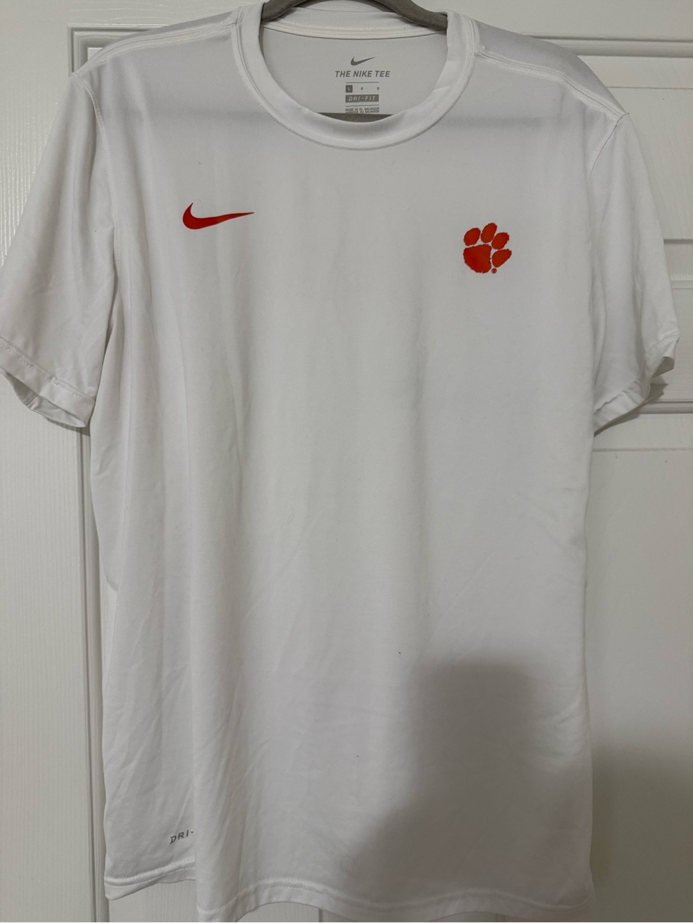 Nike White Short-Sleeve Dri-FIT Tee with Orange Paw and Swoosh